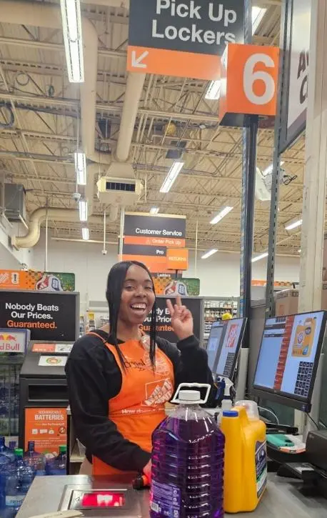 Crystal Beverly smiling while working at Home Depot in Roselle