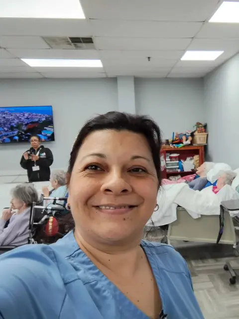 Eliana Gil working in a senior care setting